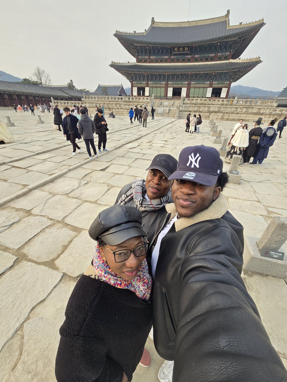 Ademola and his parents at Gyeongbokgung Palace